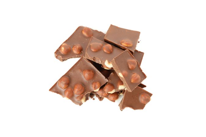 Tasty chocolate pieces isolated on plain background