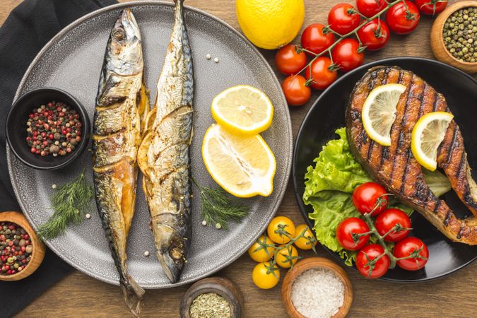 Top view of delicious smoked fish on plate