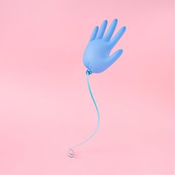Blown up balloon-like latex glove