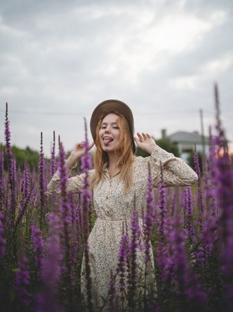 Romantic women in salvia field