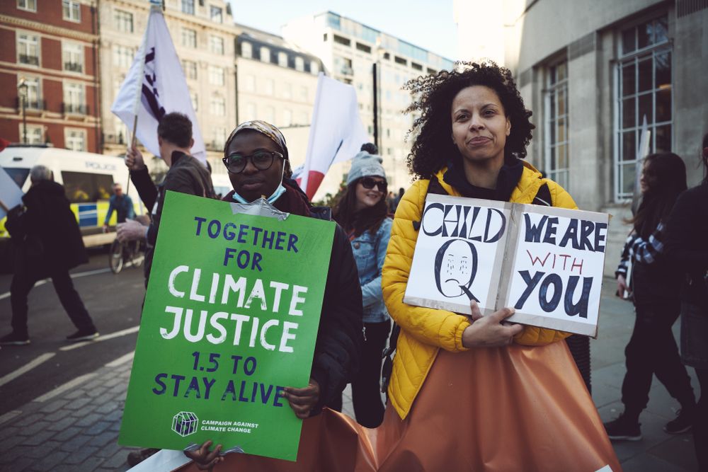 London, England, United Kingdom - March 19 2022: Two women of color at a protest