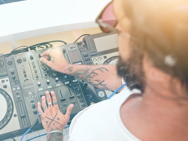 Disc jockey using control panel for creating music