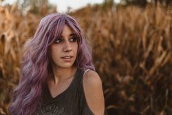 Woman in dry vegetation