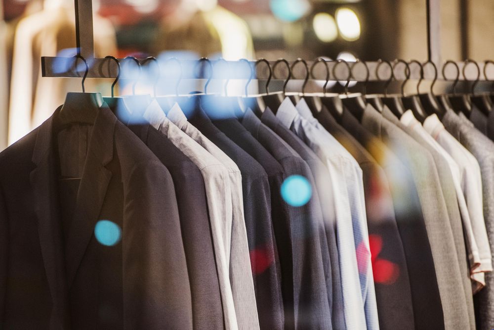 Clothes rack of blazers in fashion store