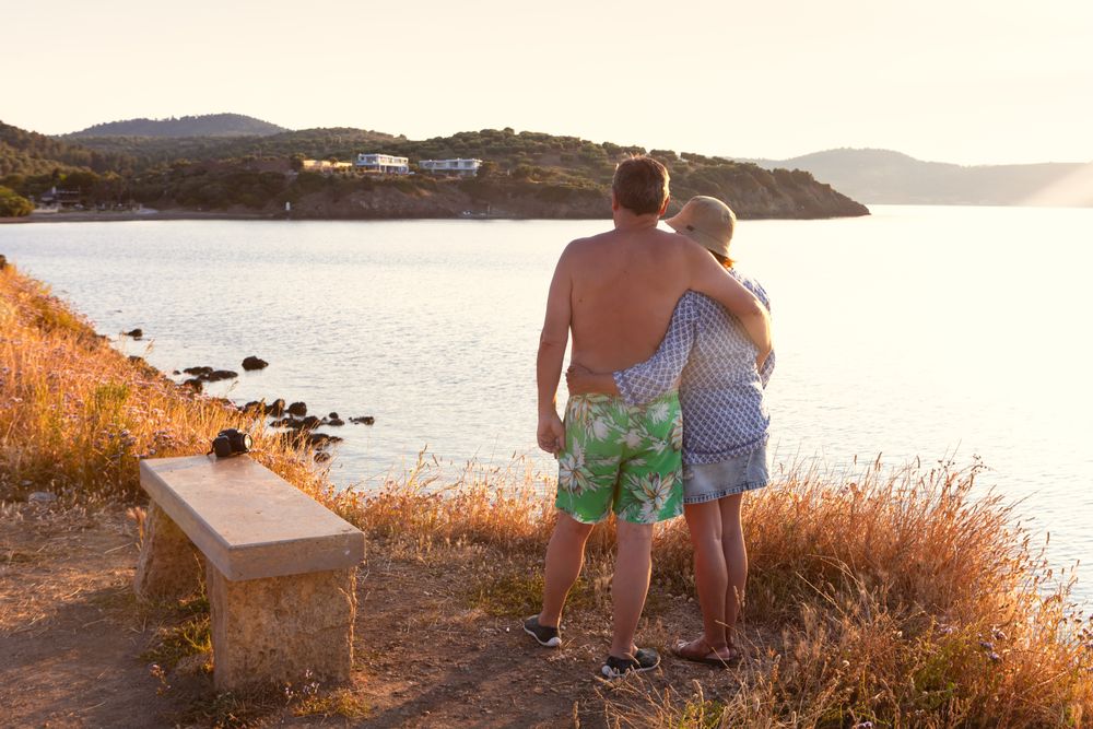 couple bonding and observing seascape
