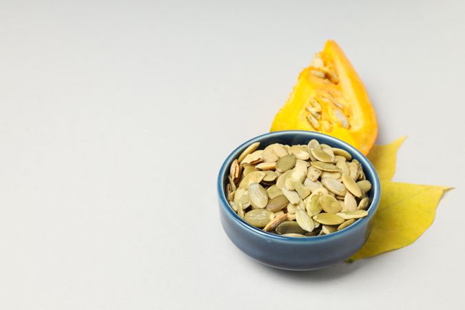 Concept of Autumn vibe food, Pumpkin, Pumpkin seeds, space for text