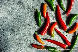 Spicy peppers on grey kitchen counter with copy space 56Gv6d