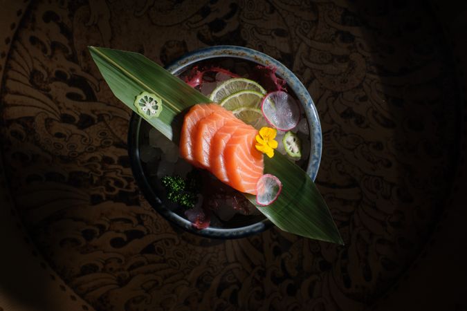 Salmon sashimi on banana leaf
