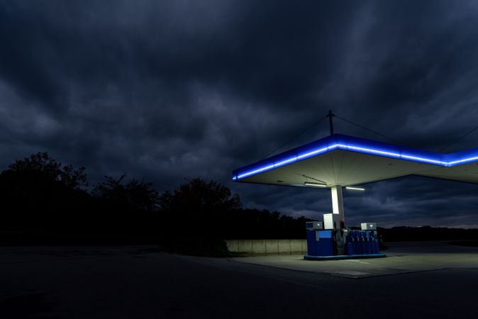 Gas station in the night on the road side in a german village