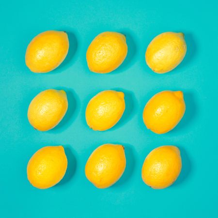 Lemons on bright blue background