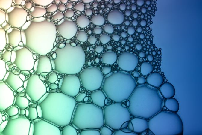 Abstract background bio technology, macro photography foam and water with gradient background. Molecule multicolor backgorund