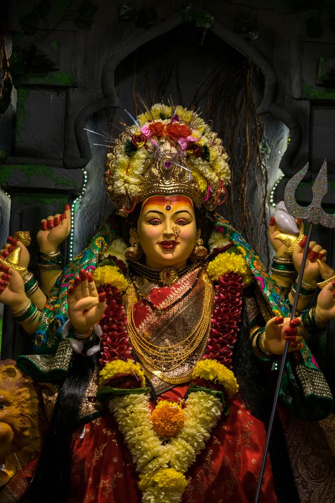 A beautiful idol of Maa Durga being worshipped at a pandal during Navratri in Mumbai, India