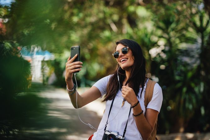 Female traveler taking selfie