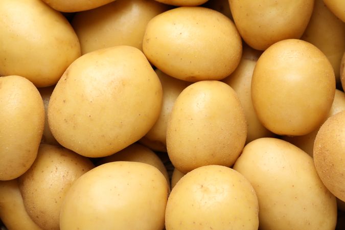 Close up of pile of fresh potatoes
