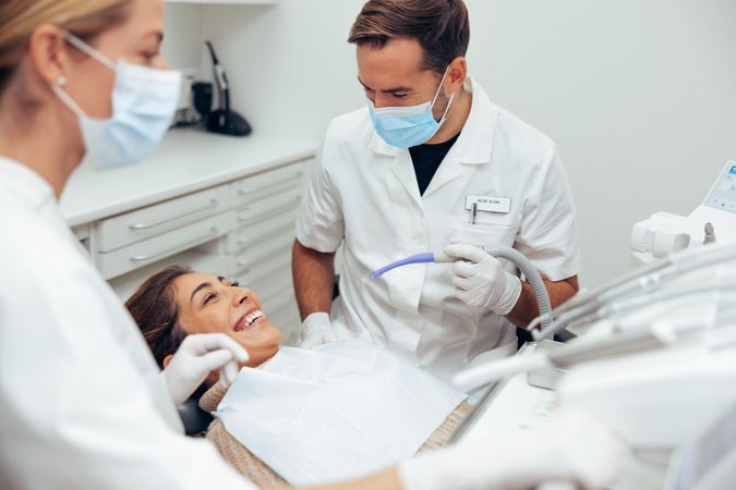 Female patient undergoing teeth procedure