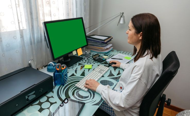 Woman looking at computer screen