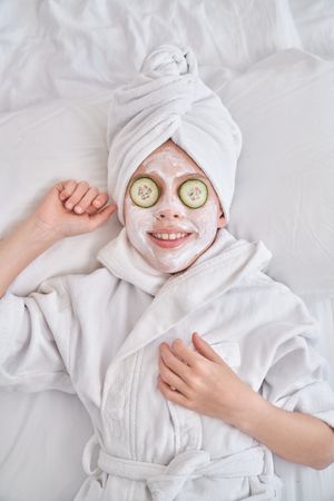 Child enjoying beauty procedures at home