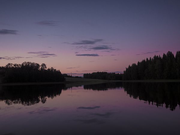 Sunset landscape with river and forest