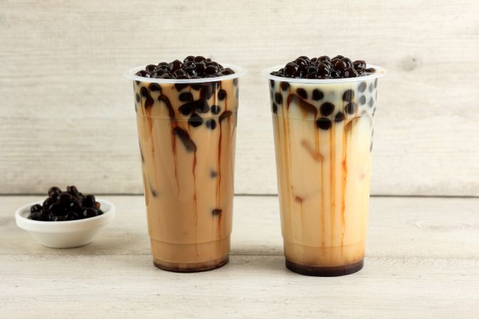 Asian Taiwan Milk Tea or Bobba Pearl on Tall Plastic Glass
