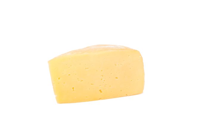 Piece of cheese isolated on plain background