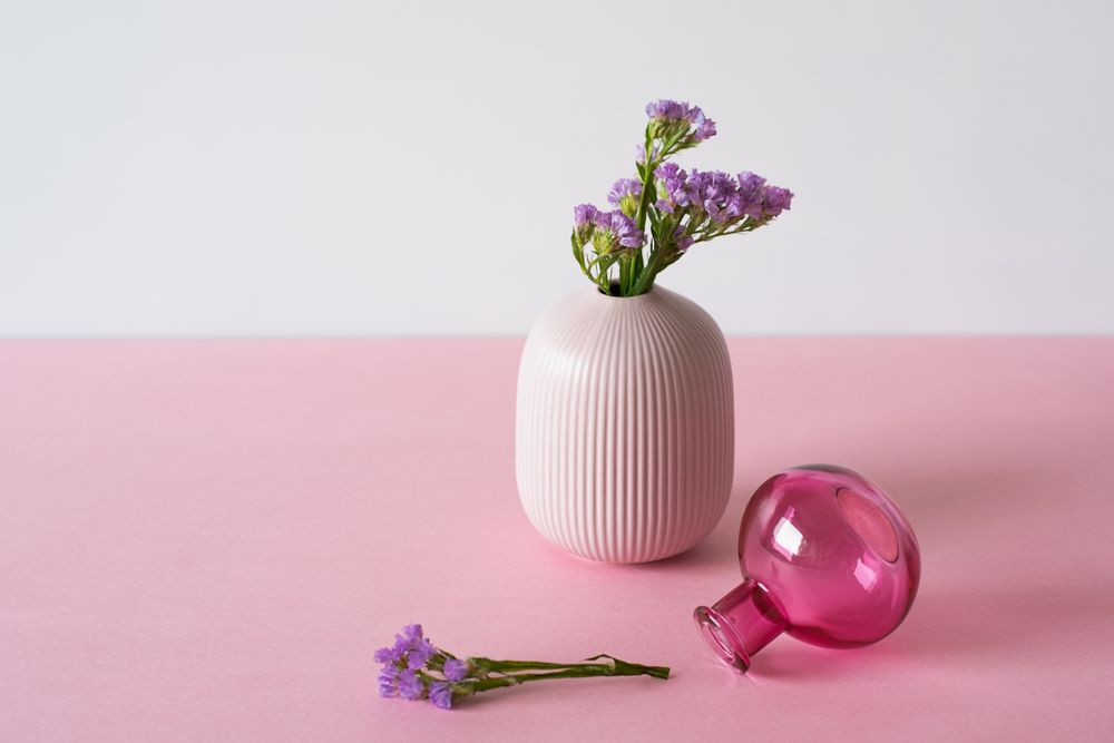 Violet sea lavender flowers in a pink