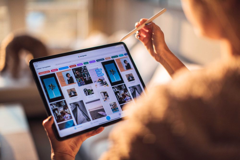 Person holding ipad with pen
