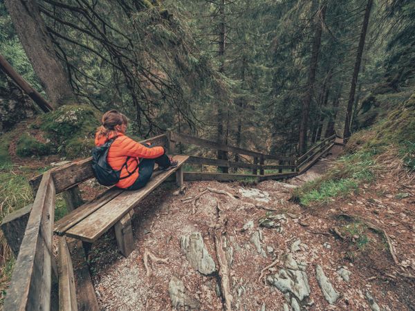 Tourist resting hiking path