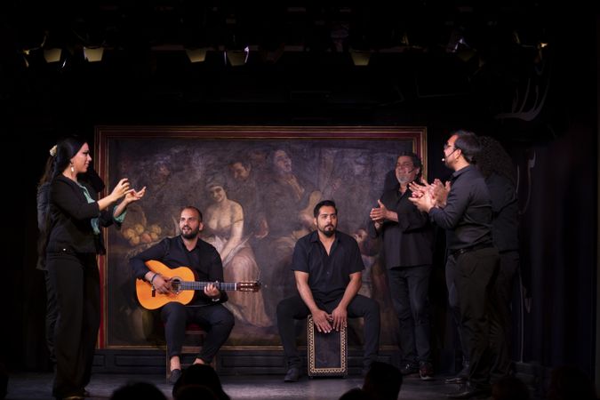 Musicians playing instruments on stage