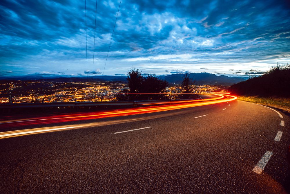 View of abstract shines on road at night