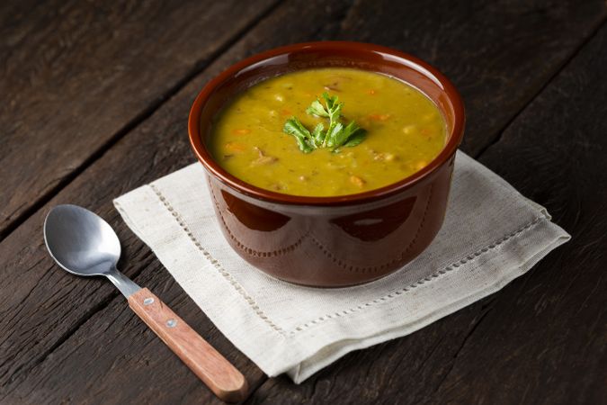 Pea soup. Bowl with pea soup on the table