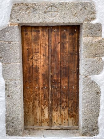 Patmian wood door with decorative motif