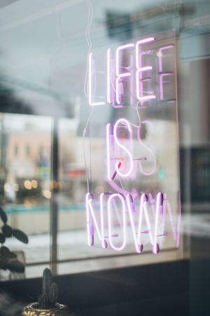 Life Is Now neon signage