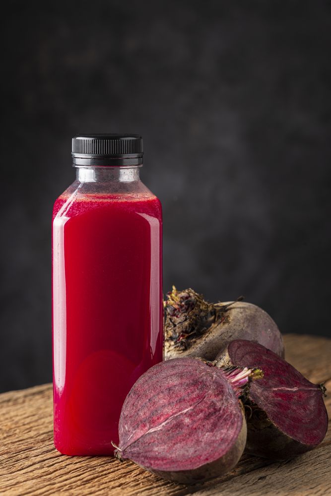 Red beet juice in plastic bottle.