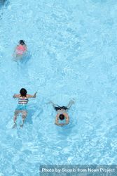 Top view of children swimming in pool 4mwKB0
