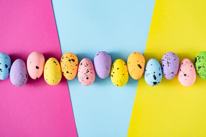 Pastel Easter eggs on colorful  pastel background