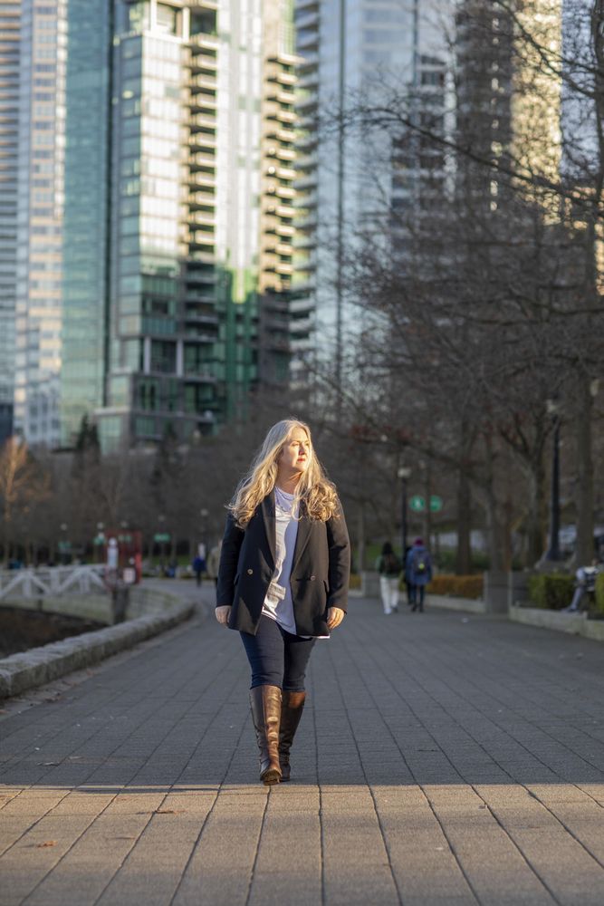 Mature woman walking in the city during the morning hours