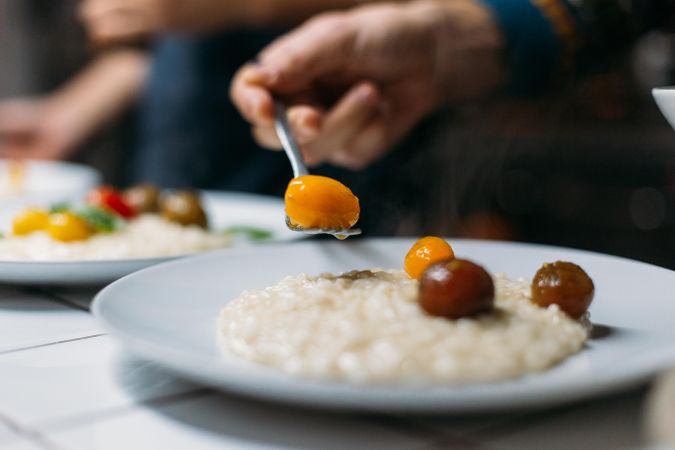 Close up of risotto with heirloom tomatoes