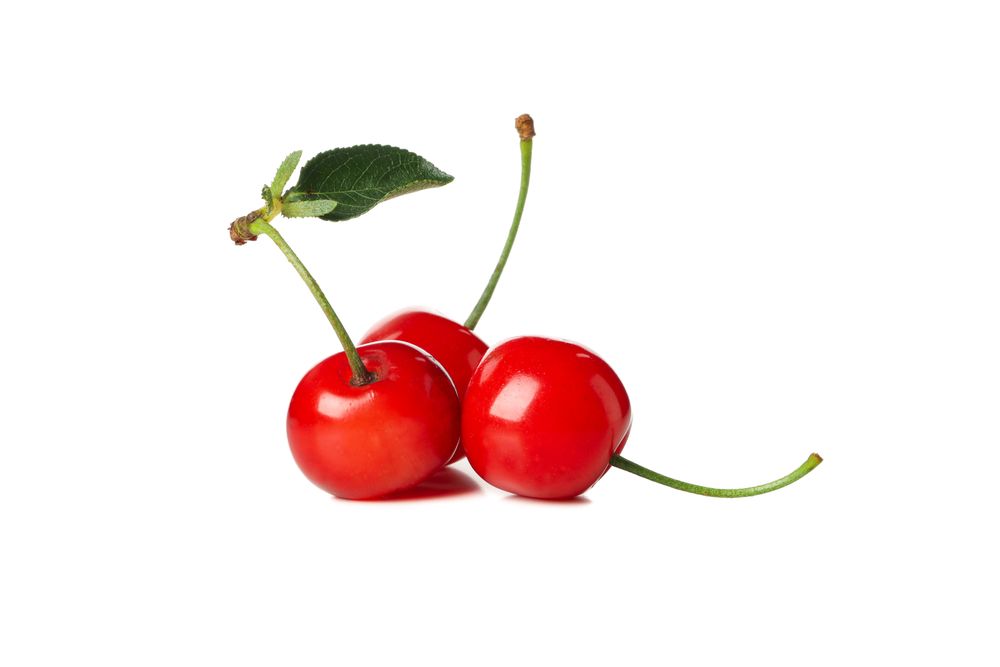Fresh red cherry isolated on blank background