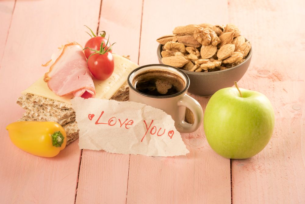 Love you message written on paper