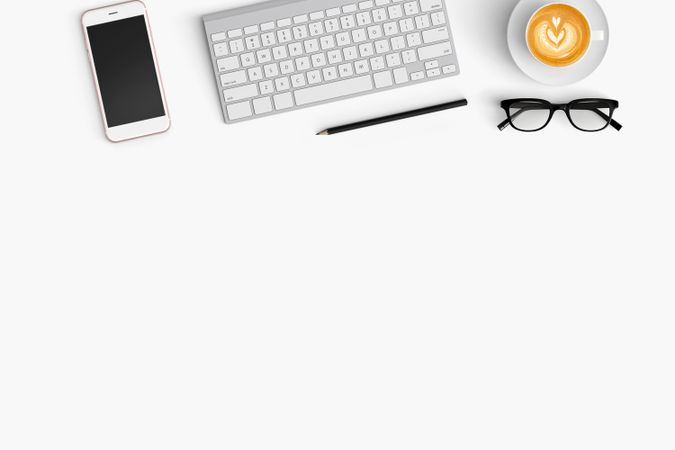 Modern workspace with coffee cup, smartphone and paper copy space