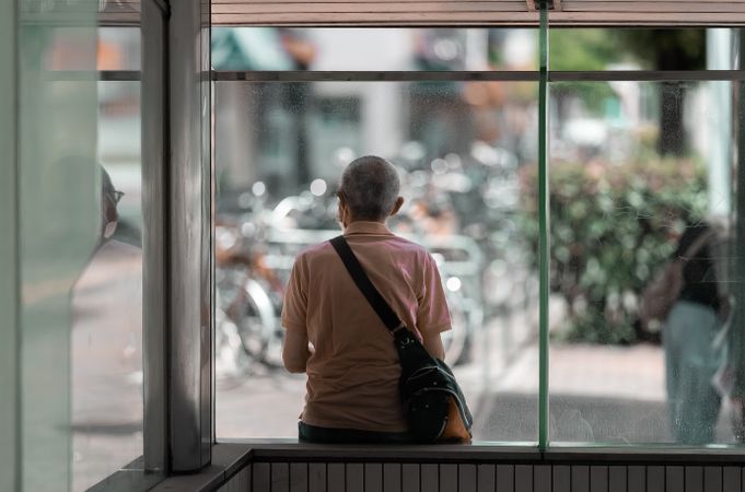 A Moment of Reflection – Older man in the City