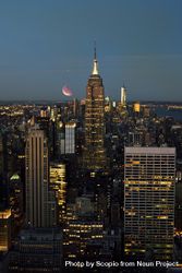 New York city skyline at night under crescent moon 489z7b