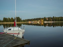 Yacht at pier on lakeside in Finland