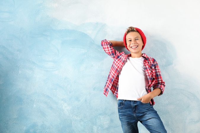 Fashion boy on color background, space for text