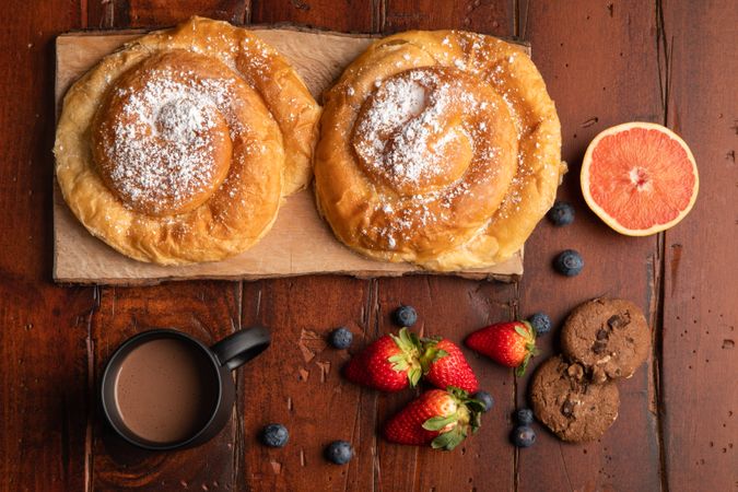 Breakfast food and drink on wooden table