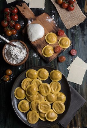 Homemade ravioli made with parmesan cheese, tomato and basil.