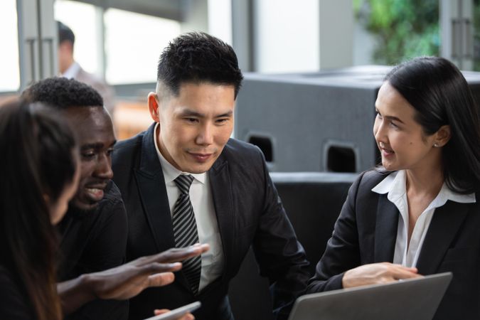 Diverse group of business people having an online client consultations