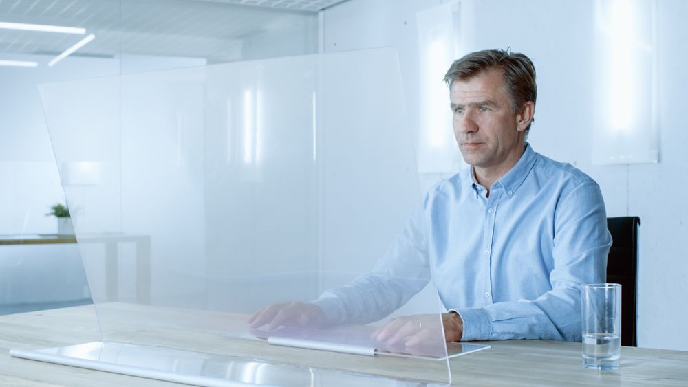 In the Near Future Professional Engineer Works on Transparent Computer Display