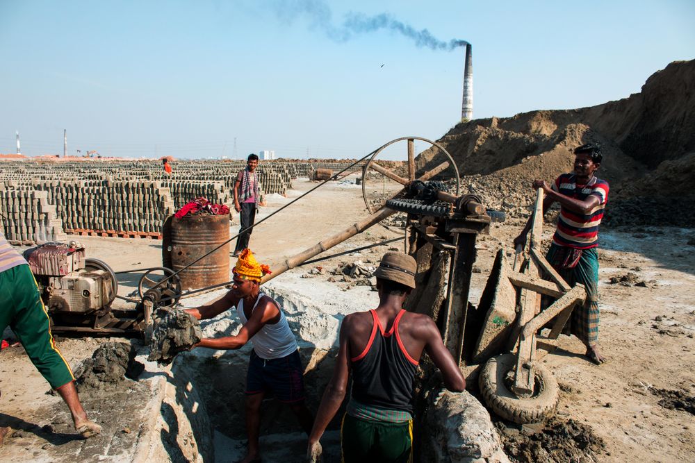 Laborers working at brick factory field in Dhaka, Bangladesh