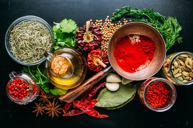 Assorted spices near fresh oil